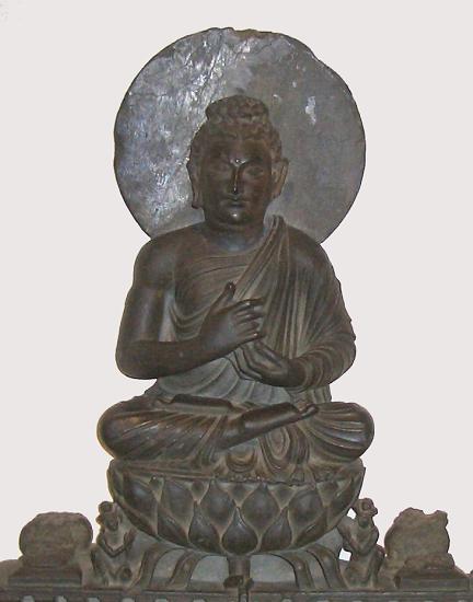 Superb ghandaran Shakyamui Buddha carved from black stone from the collection at the Portland Art Museum, Portland, OR 2006 - 3rd Century A.D. (ca. 24 in. tall)