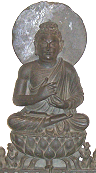 Click to see full size superb ghandaran Shakyamui Buddha carved from black stone from the collection at the Portland Art Museum, Portland, OR 2006 - 3rd Century A.D. (ca. 24 in. tall)
