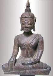 carved wood Buddha from Laos with traces of gilt (6 in. tall) - 18th C