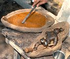 A mold being prepared with the lost wax method.